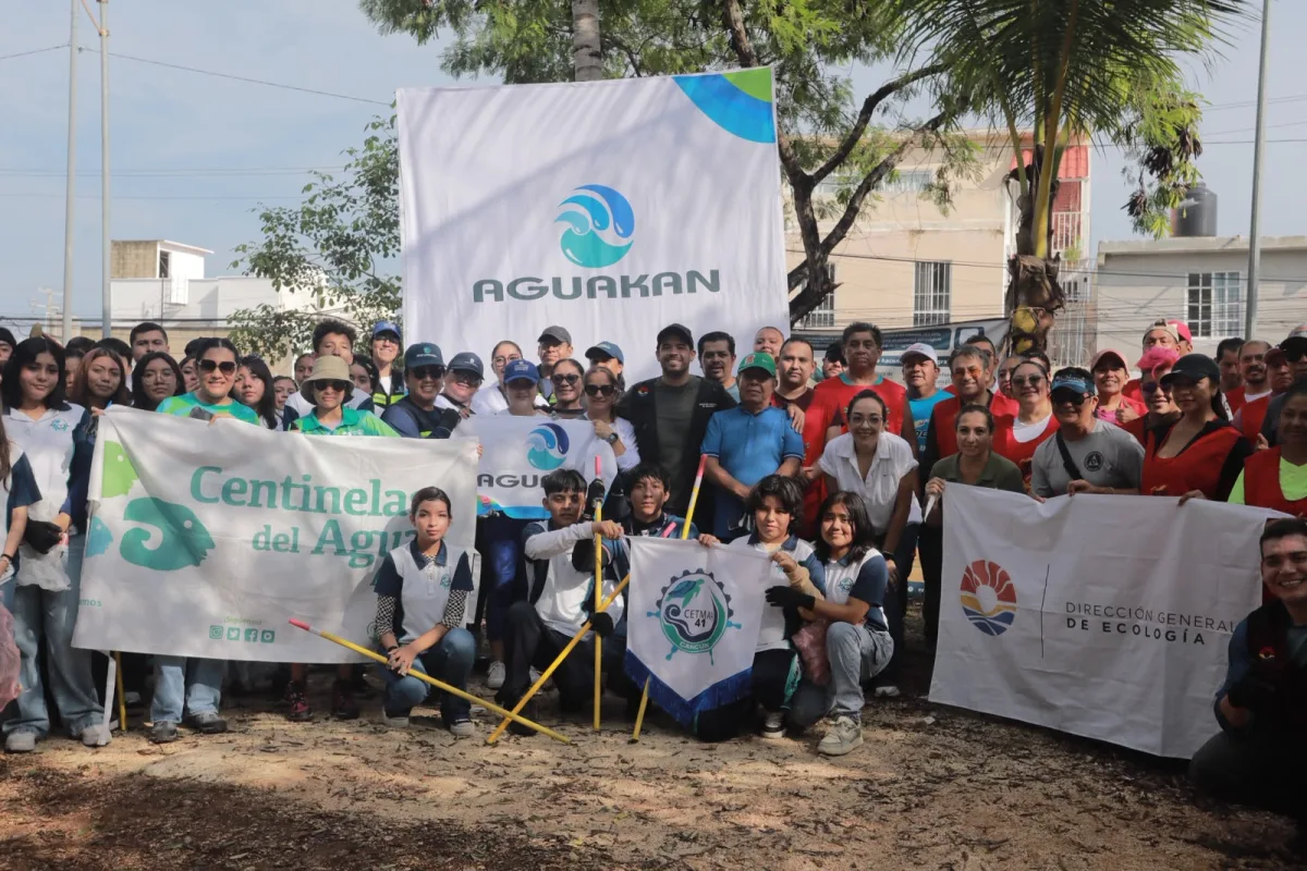 Volunteers remove trash from an urban cenote in Cancún's SM 523